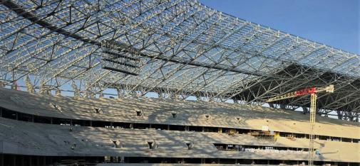 View inside the New Ferenc Puskás Arena in Budapest. There, 15,000 m² of grandstand flooring was coated with MC-Floor TopSpeed flex, the flexible roller coating with crack-bridging properties.